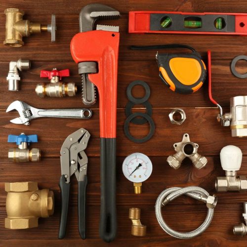plumber-tools-flatlay-red-wrench-img